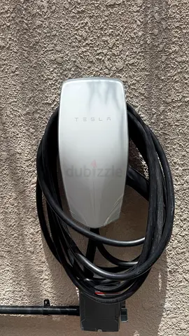 Tesla charger original price 2300AED