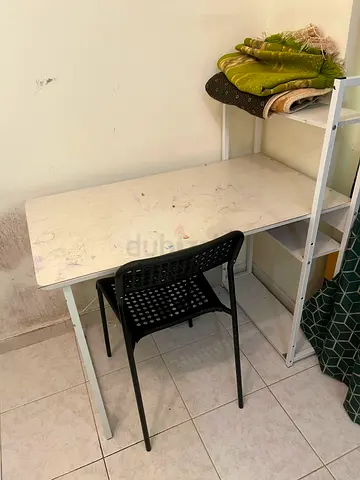 Compact white study desk with shelving - good condition