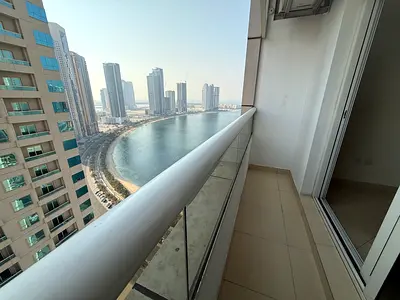SEE VIEW SPACIOUS ONE BHK WITH BALCONY POOL & GYM EASY TO DUBAI EXCESS