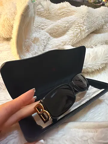 Black balenciaga designer sunglasses with protective case