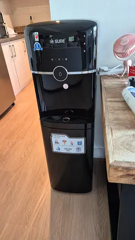 Black freestanding water dispenser bottom feeding - hot  cold