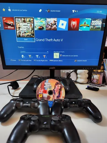 PlayStation 4 Slim with 4 Controllers and GTA V