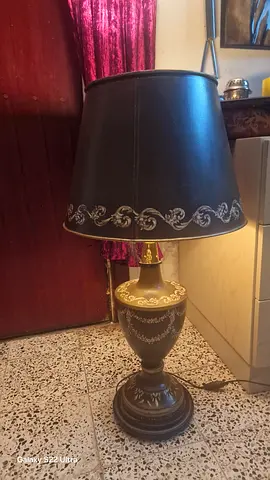 Brown decorative table lamp with gold accents
