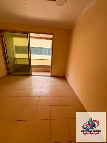 Near the beach 1BR apartment with hall balcony 2 baths built in wardrobes central AC and gas Flexible payments Prime location easy access to Dubai exi