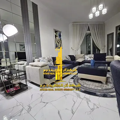 Luxury apartment for monthly rent, two bedrooms and a hall with a sea view, fully furnished with high-end hotel furniture and a fully equipped kitchen