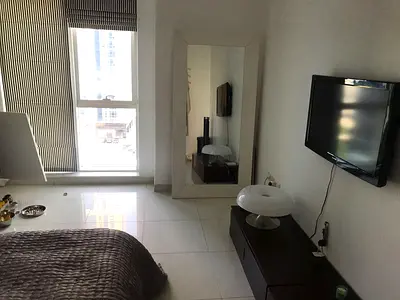 Studio Hotel Apartment | Candace Acacia | Balcony | Pool & City View