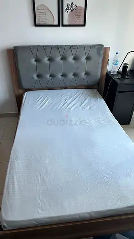 Queen wooden bed frame with upholstered headboard and mattress - good condition