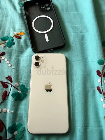 White iPhone excellent condition with MagSafe case personal used UAE version