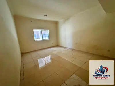 *Annual Rental in Al Qasimia, Sharjah – Spacious 2-Bedroom Apartment with Open View, Large Living Room, Central A/C and Gas, Clean Building, Prime Lo