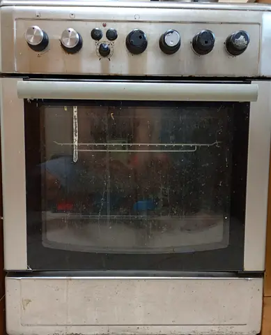 Used stainless steel freestanding gas oven and stove