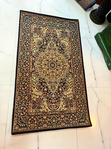 Used Persian-style decorative rug - medium size, good condition