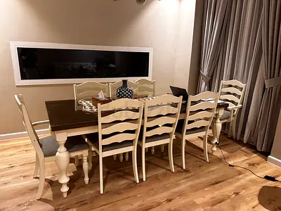 Solid wood dining table with 8 matching chairs - cream and dark wood finish