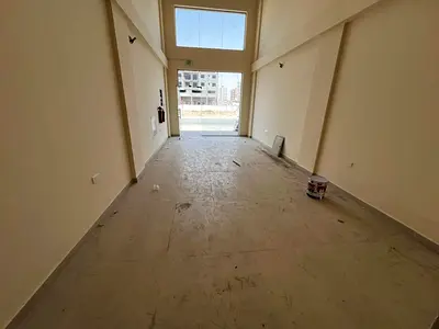 Brand New Commercial Shop for Annual Rent in Al Jurf 3 | Spacious Space Suitable for All Businesses