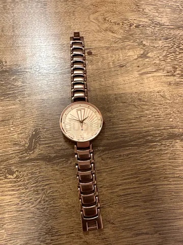Rose gold womens wristwatch with metal link bracelet