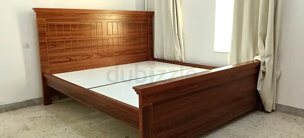 Coat and matress for sale in Madinat Zayed