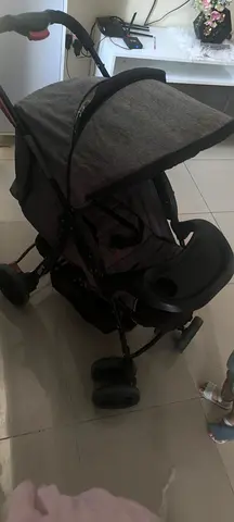 Grey lightweight standard baby stroller in good condition