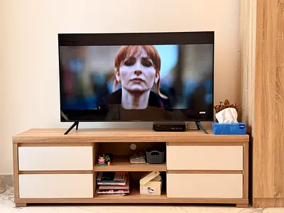 50-inch Samsung UHD TV in good working condition with stand