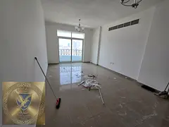 Two bedrooms and a living room in Al Majarra for annual rent with central air conditioning master be