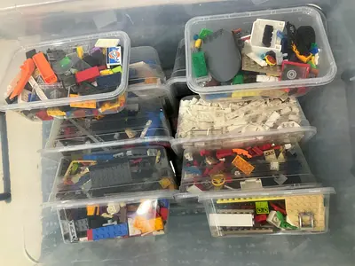 Big box filled with smaller LEGO boxes