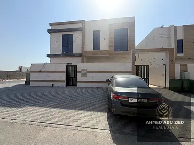 For sale in Al Helio 2: A villa featuring 7 bedrooms, a majlis, two living areas, a spacious kitche