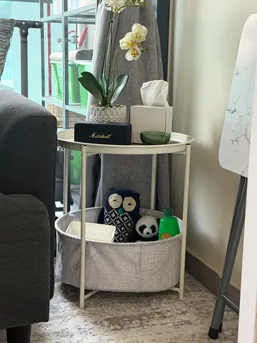 Small round side table with storage basket - light beige (display not included)