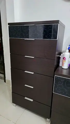 Dark wood 6-drawer tall dresser/wardrobe with decorative panels