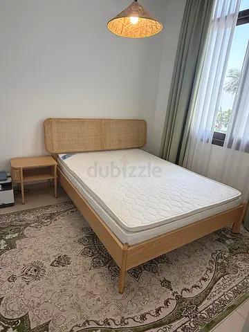 Solid wood single bed with rattan headboard and mattress