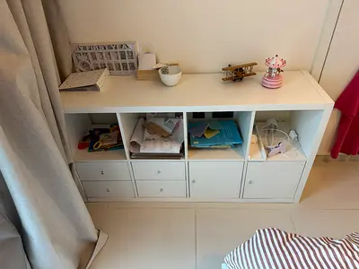 King sise bed with side tables and storage cabinet