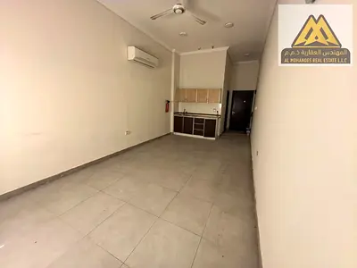 Annual spacious studio for rent in Al Mowaihat 1, Ajman. Ground floor, split AC, prime location clo