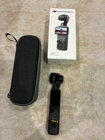 DJI Osmo Pocket 4 with Case and Original Box - Perfect Condition