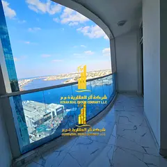 Two-bedroom apartment with a living room in Ajman - Al Rashidiya 1 - Oasis Towers - furnished with n