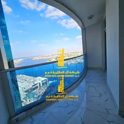 Two-bedroom apartment with a living room in Ajman - Al Rashidiya 1 - Oasis Towers - furnished with new furniture for monthly rent
