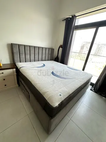 Customized upholstered storage bed frame with Intercoil mattress King Size