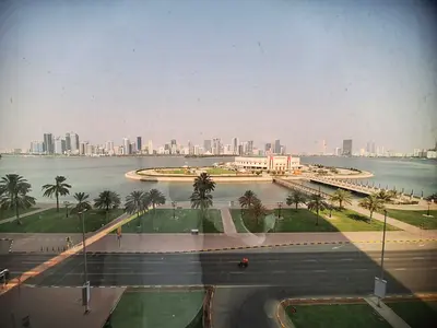 Free air conditioning and a stunning sea view in this beautiful 4-bedroom apartment with a living room, available for annual rent in Al Majaz 3, Sharj