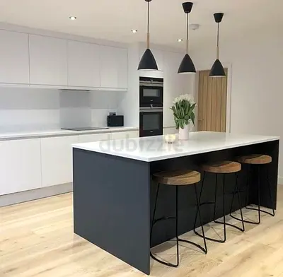 Modern kitchen island with three bar stools