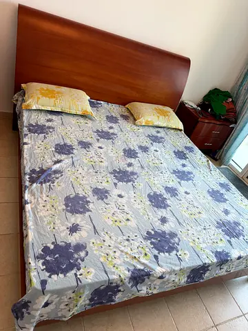 Solid wood bed frame and mattress for sale.
