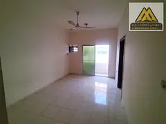 Annual one-bedroom apartment for rent in Al Rawda 3, Ajman, near Khartoum Street. Features a balcony