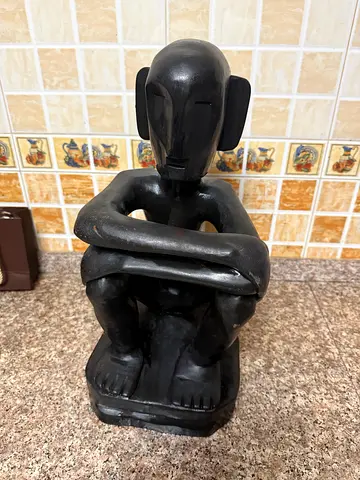 Solid Wood Tribal Sitting Man Decorative Showpiece – Excellent Condition.