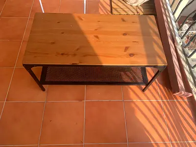 Wooden top coffee table with metal frame and lower shelf