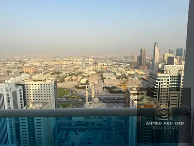 3BR apartment in Al Taawun with master bedroom, nanny room, 3 bathrooms, closed kitchen, balcony, parking, and prime location near services.