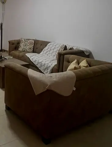 2-piece Brown Tufted Sofa Set - Good Condition