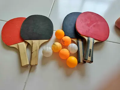 Table tennis rackets and balls