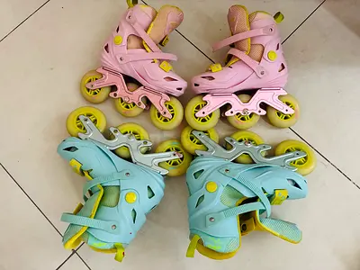Pair of adjustable kids inline skates (pink and mint) - size adjustable