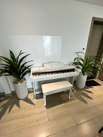 White digital piano with bench - well kept, perfect for home