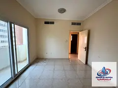 **Al Qasimia, Sharjah – Annual Rental** **Spacious 1-bedroom apartment with a beautiful balcony, o