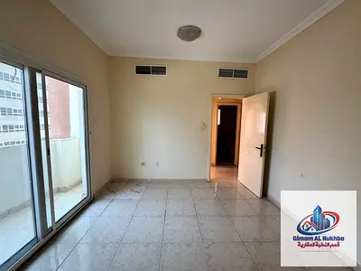 **Al Qasimia, Sharjah – Annual Rental** **Spacious 1-bedroom apartment with a beautiful balcony, offering a large and comfortable layout. Equipped wi