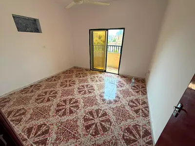 One bedroom and living room with balcony. Easy access to Sharjah, Dubai, and Sheikh Mohammed Bin Zayed Road.