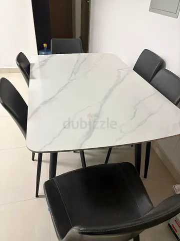 Marble top Dining table with 6 chairs for sale- Aed 550