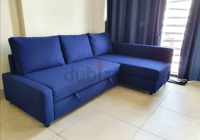 Blue L-Shaped Sofa Bed with Pull-Out Extension