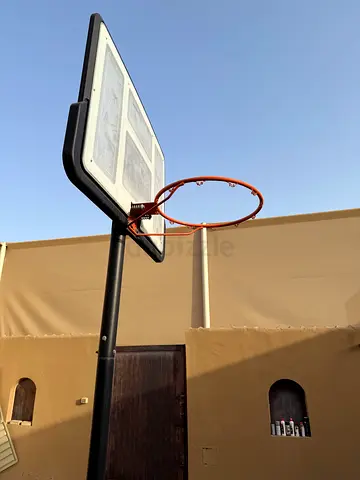 Outdoor basketball hoop and backboard - used